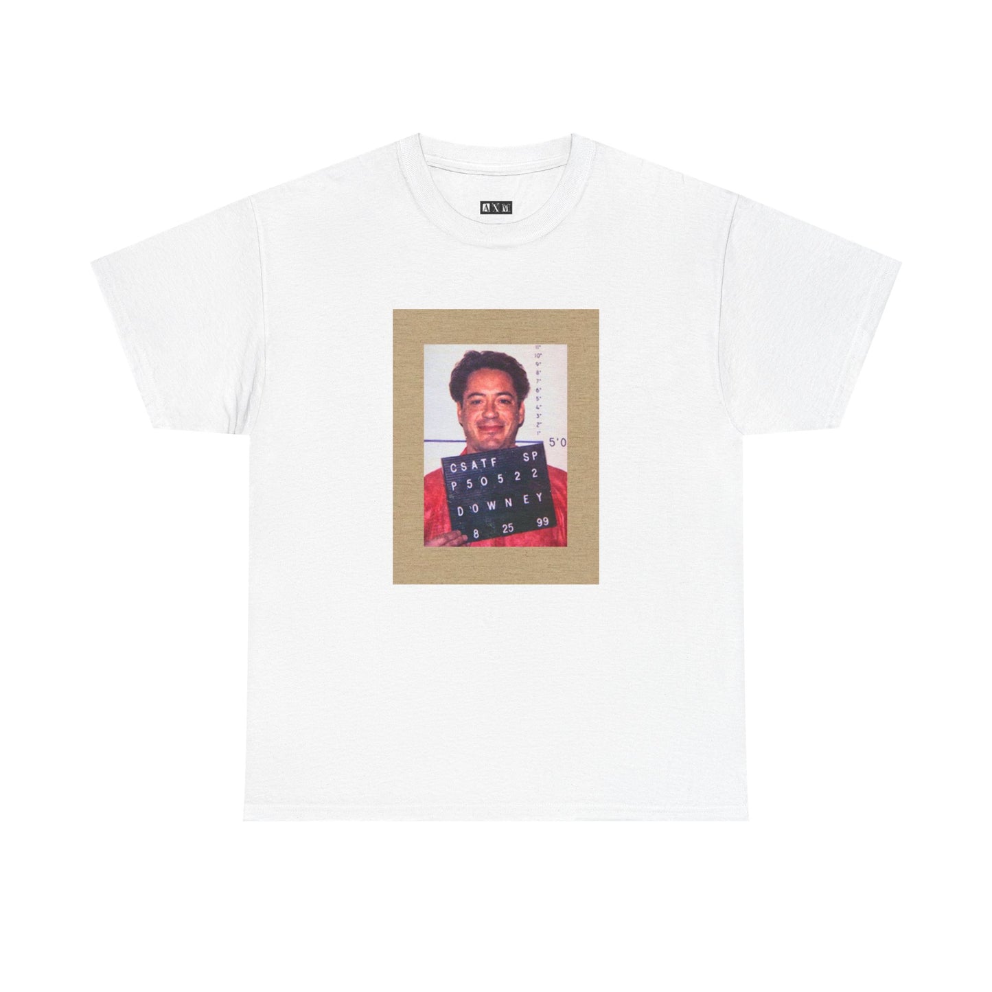 Robert Downey Jr. unisex heavyweight tee shirt featuring his infamous mugshot, a raw symbol of downfall and comeback. Wear it as a statement of grit, chaos, and ultimate redemption.