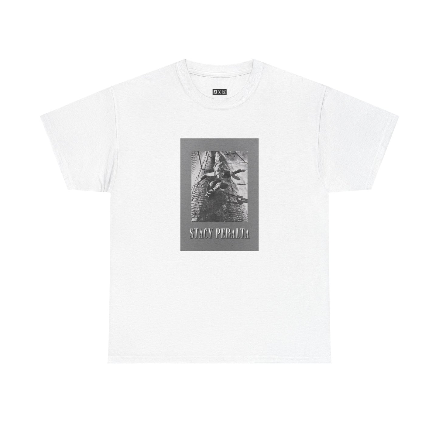 Stacy Peralta unisex heavyweight tee shirt. It unleashes skateboarding’s raw spirit with a gray border and vintage photo. A tribute to rebellion, freedom, and fearless style. Wear history. Command attention.