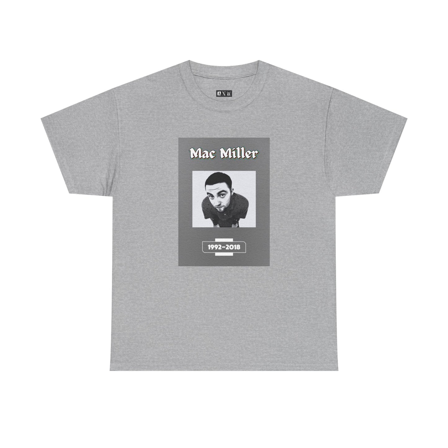 Mac Miller  unisex heavyweight tee shirt. This tribute design is a stark, powerful homage capturing the brilliance and brevity of a life that left echoes far beyond music.
